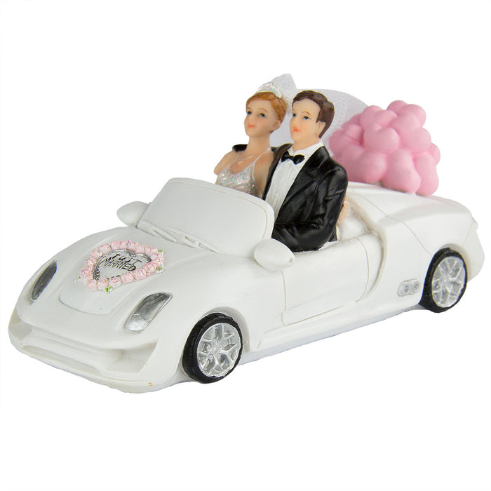 Bruidspaar in cabriolet